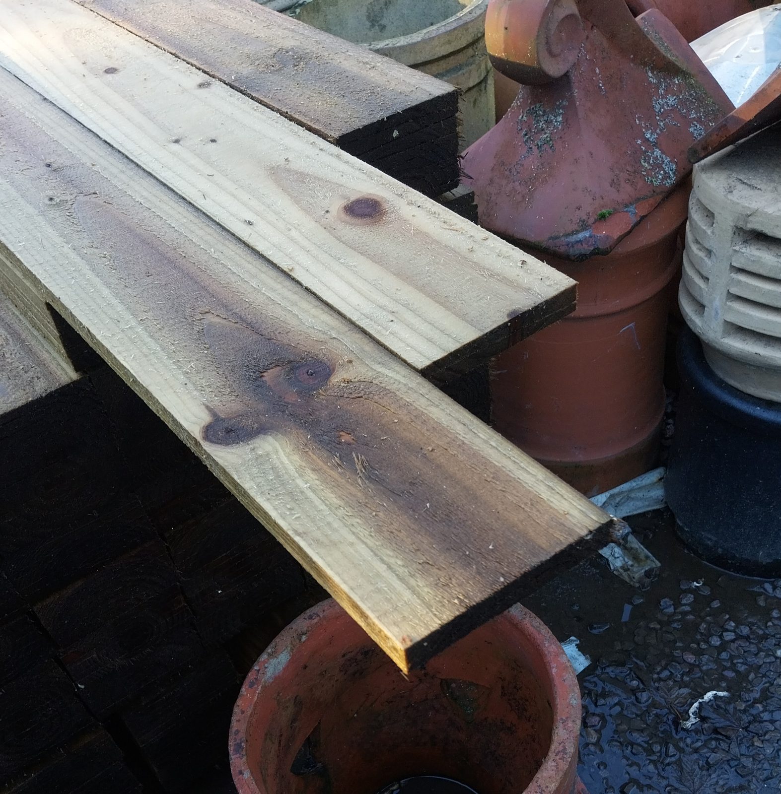 Featheredge boards stacked in the yard